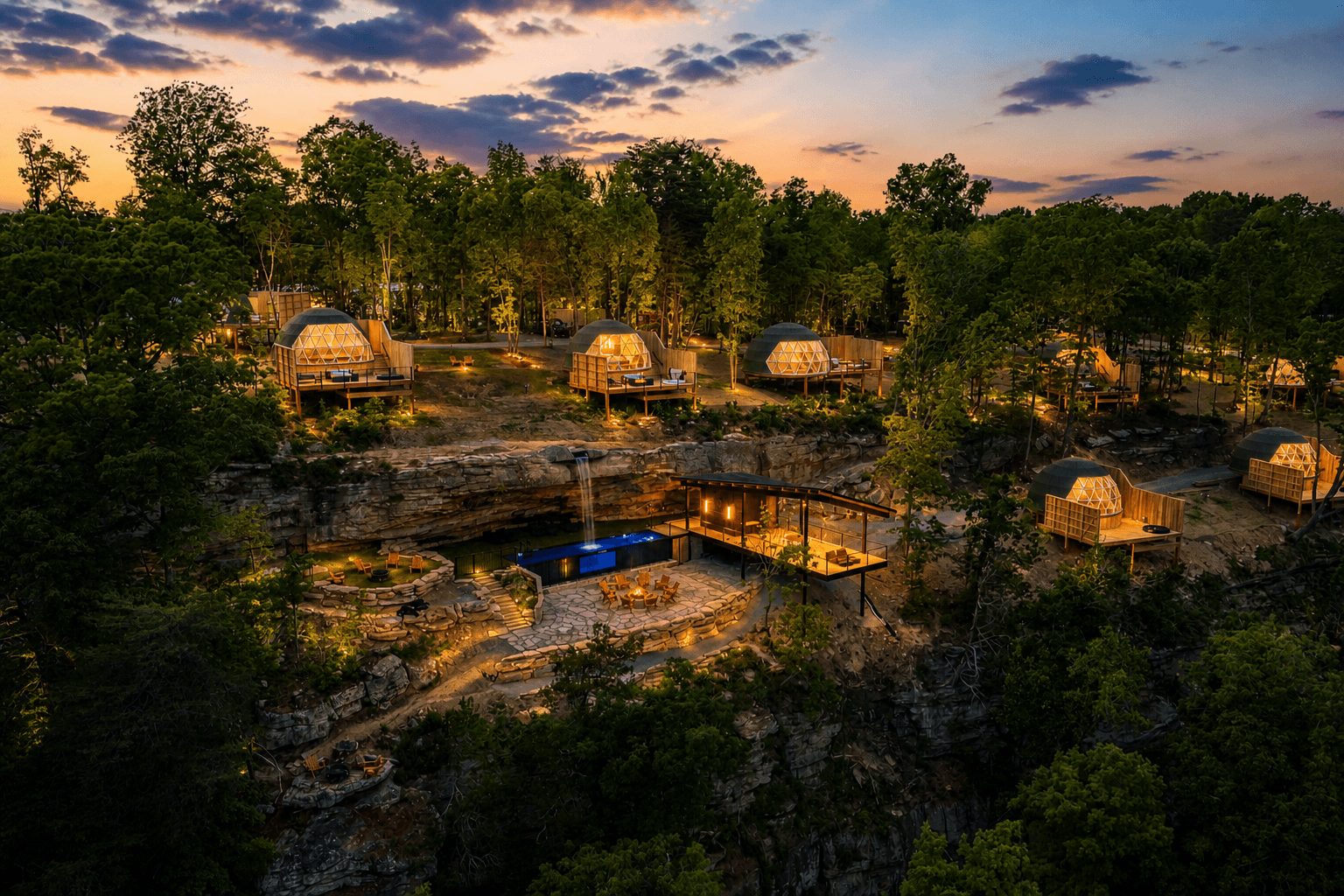 A dome glowing among trees at dusk